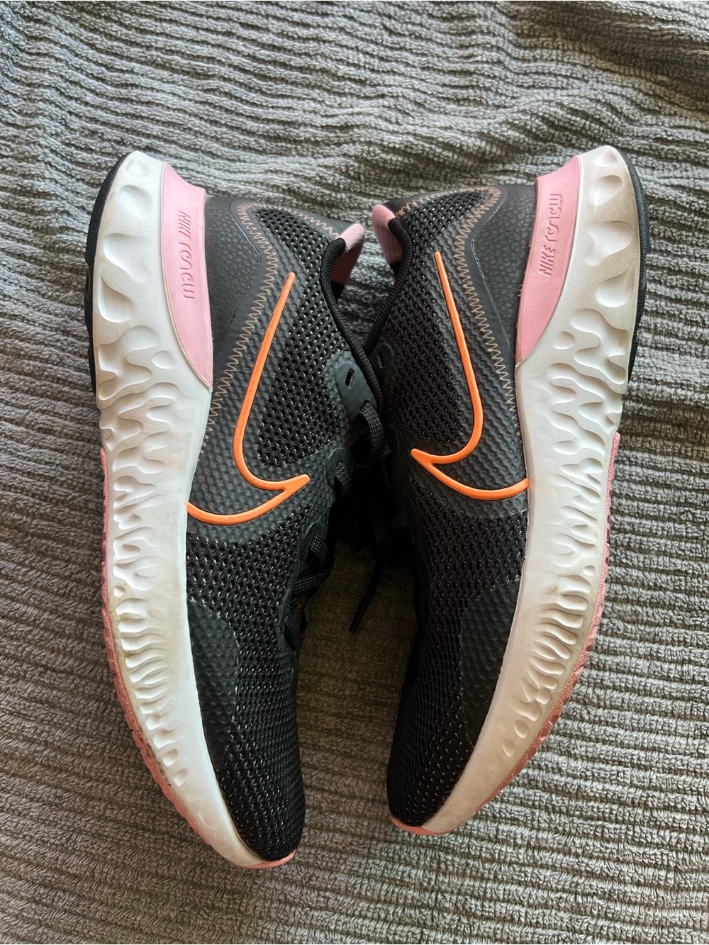 Nike Black Running Shoes with Pink Heel and Orange Swoosh